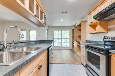 Enjoy tree top living in this nicely renovated condo in the on Stevens Park Golf Course in Texas - for sale on GolfHomes.com, golf home, golf lot