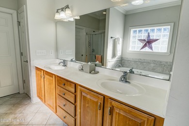 Nestled within a prestigious gated golf community, this on Brunswick Plantation and Golf Resorts in North Carolina - for sale on GolfHomes.com, golf home, golf lot