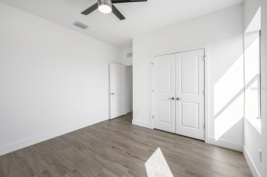 This exceptional new construction home, built by ONX Homes, is on Burnt Store Golf Club in Florida - for sale on GolfHomes.com, golf home, golf lot