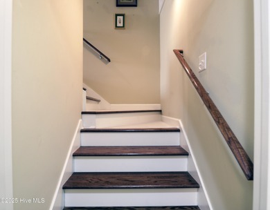 Nestled within a prestigious gated golf community, this on Brunswick Plantation and Golf Resorts in North Carolina - for sale on GolfHomes.com, golf home, golf lot