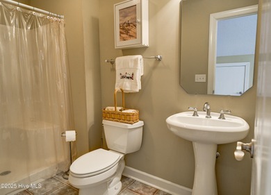 Nestled within a prestigious gated golf community, this on Brunswick Plantation and Golf Resorts in North Carolina - for sale on GolfHomes.com, golf home, golf lot