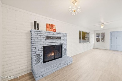 Experience the perfect blend of comfort and scenic beauty in on Prescott Golf and Country Club in Arizona - for sale on GolfHomes.com, golf home, golf lot