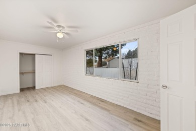 Experience the perfect blend of comfort and scenic beauty in on Prescott Golf and Country Club in Arizona - for sale on GolfHomes.com, golf home, golf lot