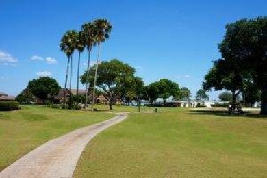 Don't miss this beautiful, fully furnished 864 sq ft home in the on Lake Henry Golf Club in Florida - for sale on GolfHomes.com, golf home, golf lot
