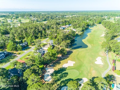 Nestled within a prestigious gated golf community, this on Brunswick Plantation and Golf Resorts in North Carolina - for sale on GolfHomes.com, golf home, golf lot