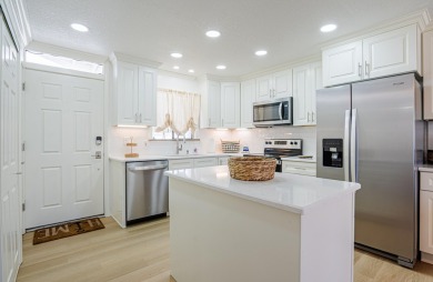 Welcome to an amenity-packed complex with great beach access! on Sandpiper Cove Golf Course in Florida - for sale on GolfHomes.com, golf home, golf lot