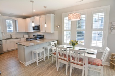 Discover coastal living at its finest in this meticulously on Barefoot Resort and Golf Club  in South Carolina - for sale on GolfHomes.com, golf home, golf lot