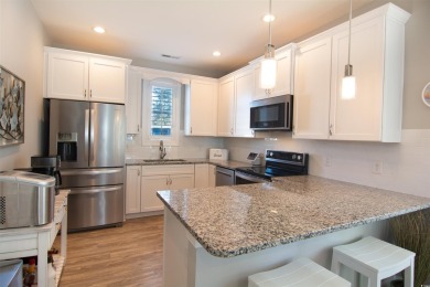 Discover coastal living at its finest in this meticulously on Barefoot Resort and Golf Club  in South Carolina - for sale on GolfHomes.com, golf home, golf lot