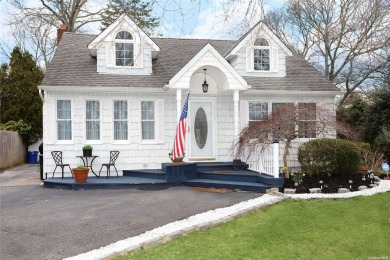 Fall in love with this charming cape in lovely Bellport Village on Bellport Country Club in New York - for sale on GolfHomes.com, golf home, golf lot