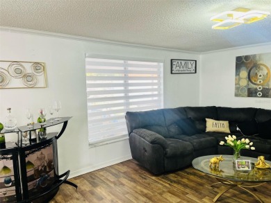 Beautifully remodeled NORTHDALE block construction homepletely on Northdale Golf and Tennis Club in Florida - for sale on GolfHomes.com, golf home, golf lot