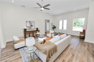 Welcome home to this beautifully updated 4-bedroom, 2-bath home on Sun n Lake Golf and Country Club in Florida - for sale on GolfHomes.com, golf home, golf lot