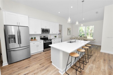 Welcome home to this beautifully updated 4-bedroom, 2-bath home on Sun n Lake Golf and Country Club in Florida - for sale on GolfHomes.com, golf home, golf lot