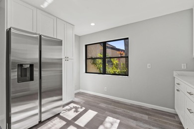 Set within Martin Downs Country Club, this 1,654 sq ft 3-bedroom on Martin Downs Country Club in Florida - for sale on GolfHomes.com, golf home, golf lot