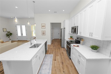 Welcome home to this beautifully updated 4-bedroom, 2-bath home on Sun n Lake Golf and Country Club in Florida - for sale on GolfHomes.com, golf home, golf lot