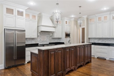 Experience elevated living in this exceptional golf course on Moores Mill Golf Club in Alabama - for sale on GolfHomes.com, golf home, golf lot