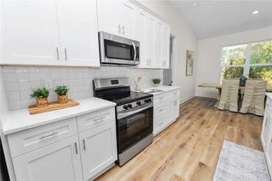 Welcome home to this beautifully updated 4-bedroom, 2-bath home on Sun n Lake Golf and Country Club in Florida - for sale on GolfHomes.com, golf home, golf lot