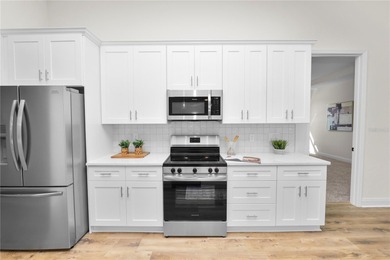 Welcome home to this beautifully updated 4-bedroom, 2-bath home on Sun n Lake Golf and Country Club in Florida - for sale on GolfHomes.com, golf home, golf lot