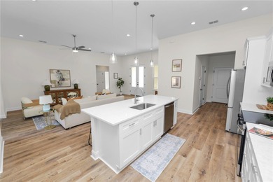 Welcome home to this beautifully updated 4-bedroom, 2-bath home on Sun n Lake Golf and Country Club in Florida - for sale on GolfHomes.com, golf home, golf lot