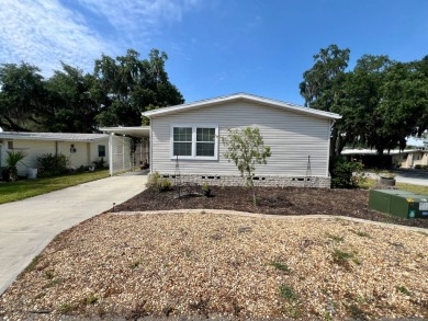 Home is located in Water Oak Country Club Estates in Lady Lake on Water Oak Country Club Estates in Florida - for sale on GolfHomes.com, golf home, golf lot