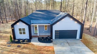 Come see this gorgeous new custom home.  1st floor master/ranch on River Golf and County Club at Lake Royale in North Carolina - for sale on GolfHomes.com, golf home, golf lot