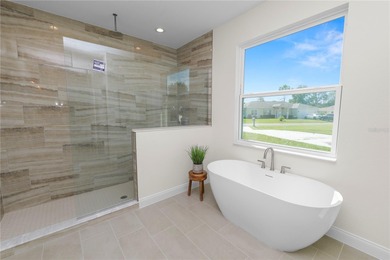 Welcome home to this beautifully updated 4-bedroom, 2-bath home on Sun n Lake Golf and Country Club in Florida - for sale on GolfHomes.com, golf home, golf lot