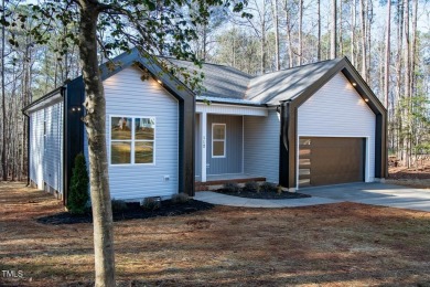 Come see this gorgeous new custom home.  1st floor master/ranch on River Golf and County Club at Lake Royale in North Carolina - for sale on GolfHomes.com, golf home, golf lot