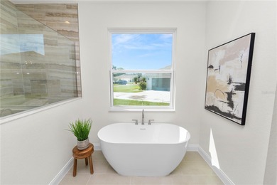 Welcome home to this beautifully updated 4-bedroom, 2-bath home on Sun n Lake Golf and Country Club in Florida - for sale on GolfHomes.com, golf home, golf lot