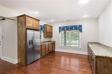 Experience elevated living in this exceptional golf course on Moores Mill Golf Club in Alabama - for sale on GolfHomes.com, golf home, golf lot