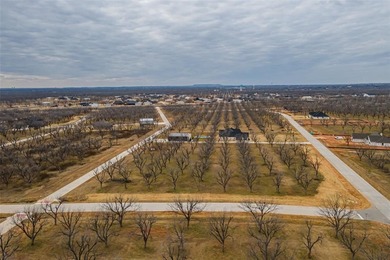 Beautiful 1.5 acre corner lot located in the highly sought after on Pecan Plantation Country Club in Texas - for sale on GolfHomes.com, golf home, golf lot