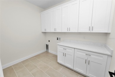 Welcome home to this beautifully updated 4-bedroom, 2-bath home on Sun n Lake Golf and Country Club in Florida - for sale on GolfHomes.com, golf home, golf lot