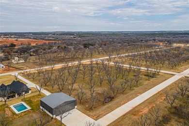 Beautiful 1.5 acre corner lot located in the highly sought after on Pecan Plantation Country Club in Texas - for sale on GolfHomes.com, golf home, golf lot