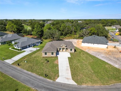 Welcome home to this beautifully updated 4-bedroom, 2-bath home on Sun n Lake Golf and Country Club in Florida - for sale on GolfHomes.com, golf home, golf lot