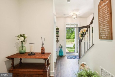 Introducing this stunning 3-story end unit townhome that on Potomac Shores Golf Club in Virginia - for sale on GolfHomes.com, golf home, golf lot