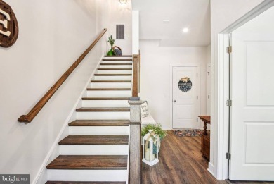 Introducing this stunning 3-story end unit townhome that on Potomac Shores Golf Club in Virginia - for sale on GolfHomes.com, golf home, golf lot
