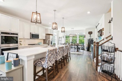 Introducing this stunning 3-story end unit townhome that on Potomac Shores Golf Club in Virginia - for sale on GolfHomes.com, golf home, golf lot
