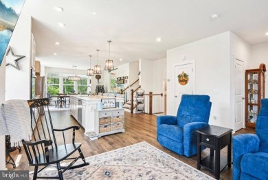 Introducing this stunning 3-story end unit townhome that on Potomac Shores Golf Club in Virginia - for sale on GolfHomes.com, golf home, golf lot