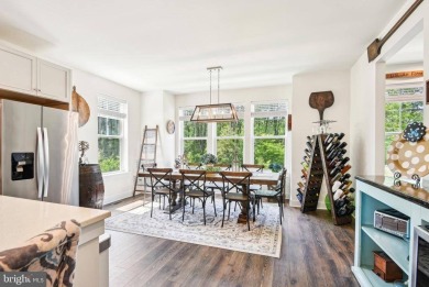 Introducing this stunning 3-story end unit townhome that on Potomac Shores Golf Club in Virginia - for sale on GolfHomes.com, golf home, golf lot