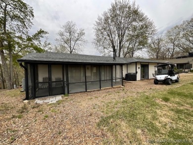 Come live on one of the friendliest fairways at the Lake!  The on The Oaks Golf Course in Missouri - for sale on GolfHomes.com, golf home, golf lot