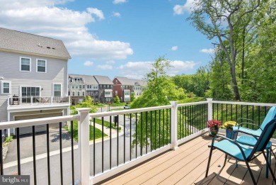 Introducing this stunning 3-story end unit townhome that on Potomac Shores Golf Club in Virginia - for sale on GolfHomes.com, golf home, golf lot