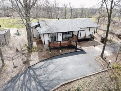 Come live on one of the friendliest fairways at the Lake!  The on The Oaks Golf Course in Missouri - for sale on GolfHomes.com, golf home, golf lot