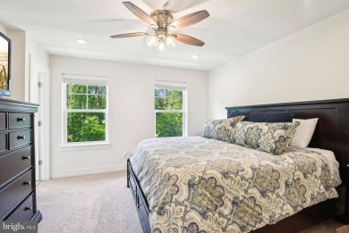 Introducing this stunning 3-story end unit townhome that on Potomac Shores Golf Club in Virginia - for sale on GolfHomes.com, golf home, golf lot