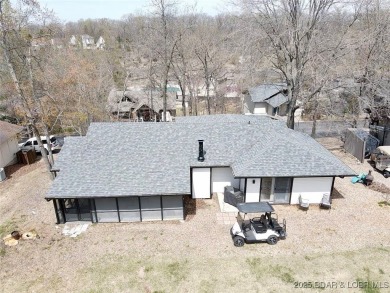 Come live on one of the friendliest fairways at the Lake!  The on The Oaks Golf Course in Missouri - for sale on GolfHomes.com, golf home, golf lot