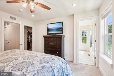 Introducing this stunning 3-story end unit townhome that on Potomac Shores Golf Club in Virginia - for sale on GolfHomes.com, golf home, golf lot