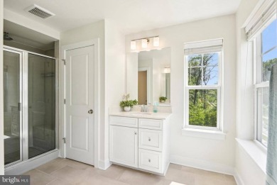 Introducing this stunning 3-story end unit townhome that on Potomac Shores Golf Club in Virginia - for sale on GolfHomes.com, golf home, golf lot
