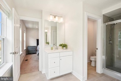 Introducing this stunning 3-story end unit townhome that on Potomac Shores Golf Club in Virginia - for sale on GolfHomes.com, golf home, golf lot