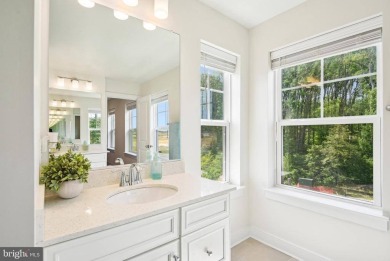 Introducing this stunning 3-story end unit townhome that on Potomac Shores Golf Club in Virginia - for sale on GolfHomes.com, golf home, golf lot