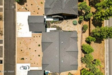Tucked inside a scenic golf community near lakes and hiking on Bison Golf and Country Club in Arizona - for sale on GolfHomes.com, golf home, golf lot