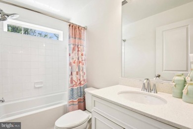 Introducing this stunning 3-story end unit townhome that on Potomac Shores Golf Club in Virginia - for sale on GolfHomes.com, golf home, golf lot