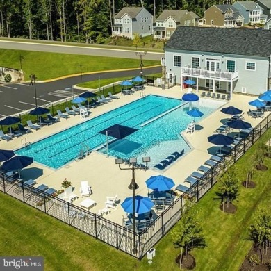 Introducing this stunning 3-story end unit townhome that on Potomac Shores Golf Club in Virginia - for sale on GolfHomes.com, golf home, golf lot
