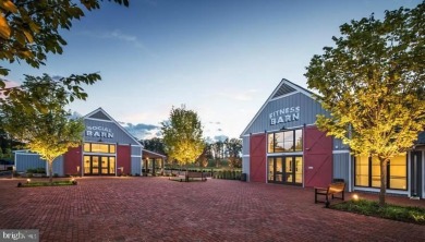 Introducing this stunning 3-story end unit townhome that on Potomac Shores Golf Club in Virginia - for sale on GolfHomes.com, golf home, golf lot